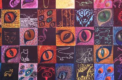 A photo of hand drawn artworks on the wall in the Clore Studio at Tate Liverpool