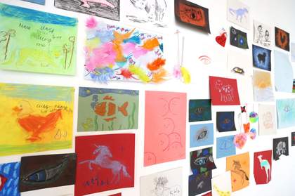 A photo of drawings on a wall in the Clore Studio at Tate Liverpool
