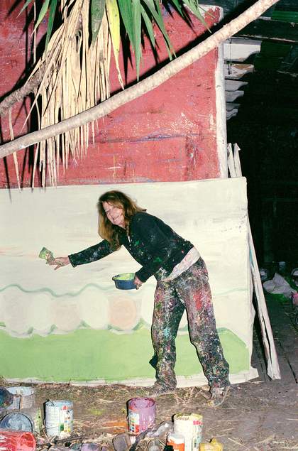 Vivian Suter painting at night outside one of her studios in Panajachel, Guatemala