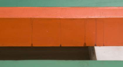 Dirt and grime accumulation on the surface of one of the columns.