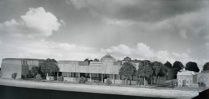 Image of a black and white photo of an architect's model for a new extension.