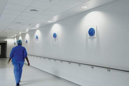A member of the medical team at the Royal London Hospital oberves Roger Hiorns's Untitled 2012