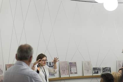Female Archive Explorer volunteer presenting to group at Tate Britain