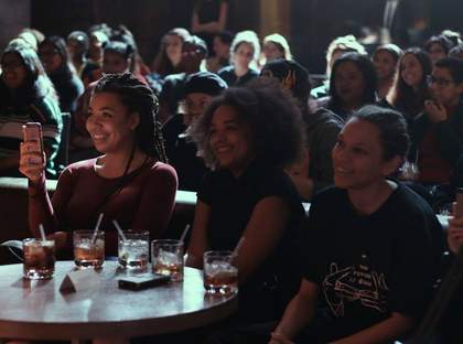 girls sitting at a table