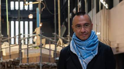 Mexican Artist Abraham Cruzvillegas in front of his 2015 work Empty Lot