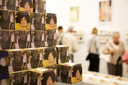 Customers and Tate products in the Shop at Tate Liverpool