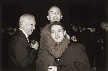 Damien Hirst (right) at the Tate after receiving the Turner Prize with artists Michael Craig-Martin (left) and Grenville Davey (centre), 1995