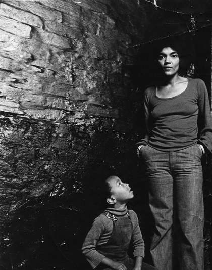 A black and white photograph of Darcus Beese and his mother, Barbara Beese