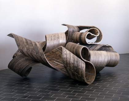 Richard Deacon Restless 2005 showing a twisted wood floor sculpture by the artist