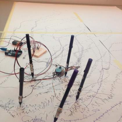 Side view of the results and equipment made on the digital makers drawing workshop, showing sketchy lines and battery circuits