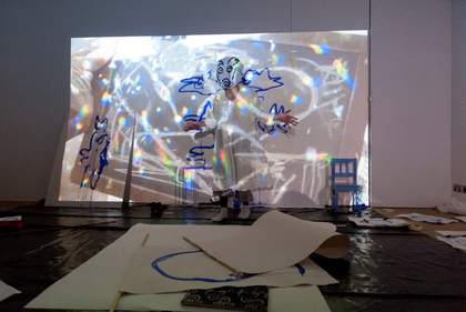 A projected image and drawing from Joan Jonas's Draw Without Looking