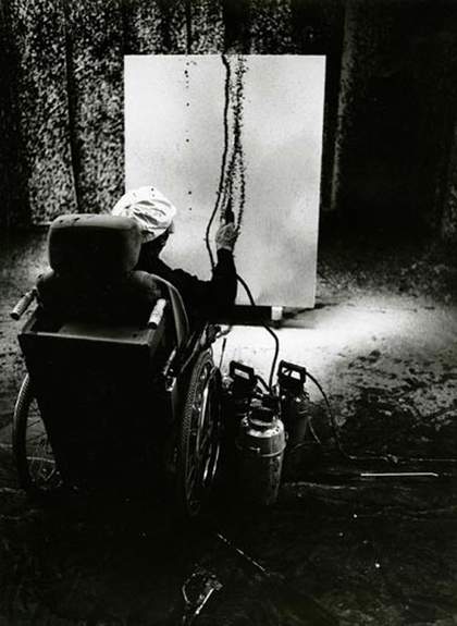 Hartung with a sprayer in his studio in Antibes 2 October 1989