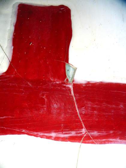 Detail of letter ‘E’ showing loss