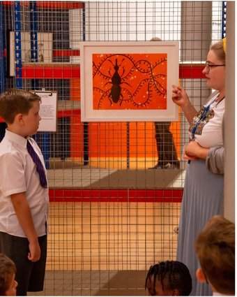 Fig.2 A school group discussing Yinka Shonibare’s Grain Weevil 2000 on display in Ideas Depot, Tate Liverpool, July 2019 Photo © Tate Artwork © Yinka Shonibare, courtesy Stephen Friedman Gallery, London