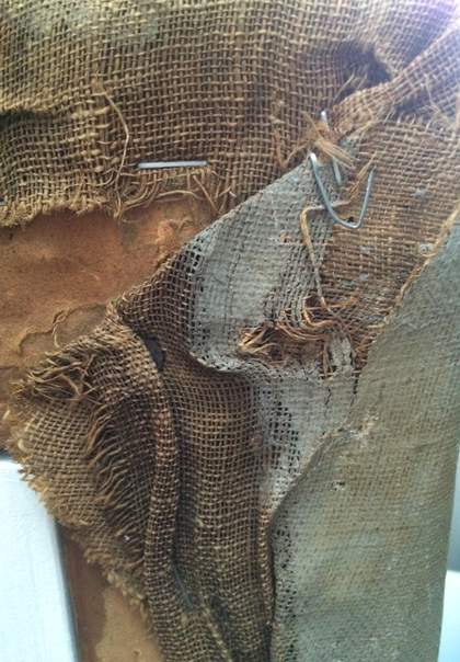 Detail of loosely woven, rough-cut canvas on the reverse side