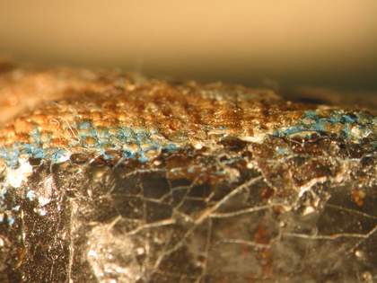 Detail of loss at top left corner