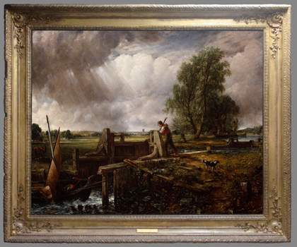 A painting of a figure operating a lock for a boat. Its frame is straight and gilded, with detailed, flowery ornamentation extending partly along each edge from the corners.