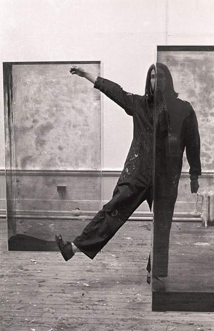 Fig.20 Alexander Hamilton (Edinburgh College of Art student assistant) with two of Erich Reusch’s triplex glass cubes during the installation of Strategy: Get Arts at the Edinburgh College of Art, August 1970