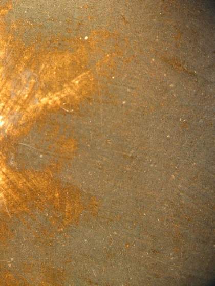 Fig.13 Detail of worn grey paint in the background, showing the yellowish-brown underpaint 