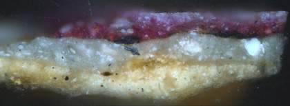 Fig.13 Cross-section through a highlight in the red drapery, photographed at x200 magnification.