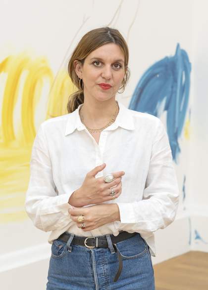 A portrait of France-Lise McGurn in the gallery