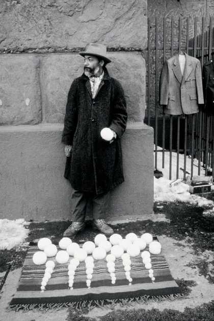 David Hammons performing Blizaard Ball Sale 1983 Cooper Square New York City