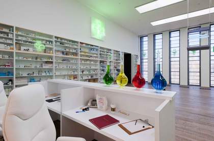 Installation view of Damien Hirst's Pharmacy at Tate Modern, 2012