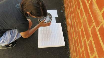 Conservation of Michael Dillon's Op Structures - sieving carbon black powder