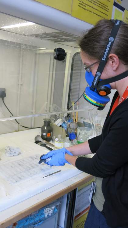 Conservation of Michael Dillon's Op Structures - dusting carbon black powder