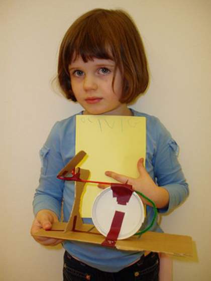 Girl with her sculpture