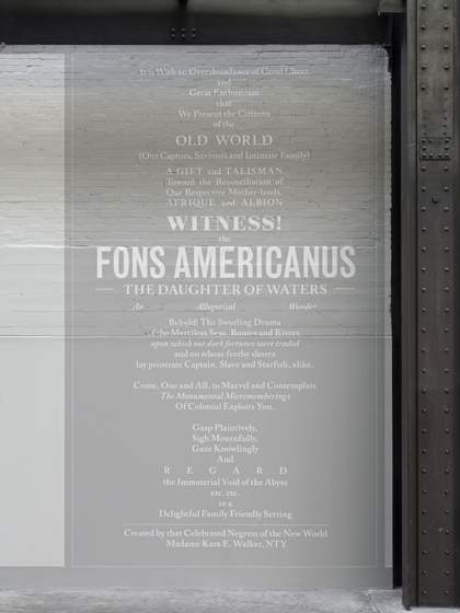 Photograph of Kara Walker's 'Fons Americanus' at Tate Modern. Detail shows captions on the wall