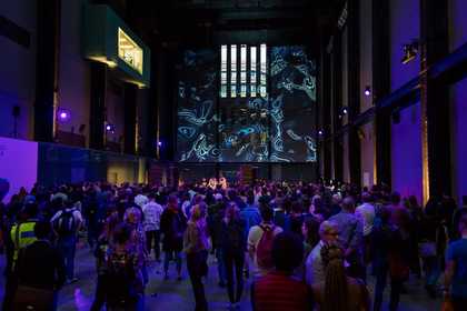 Crowd listening to a DJ