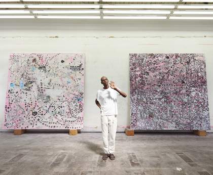 Mark Bradford in his studio in Florence, South Central Los Angeles, 2015, photographed by Jason Schmidt