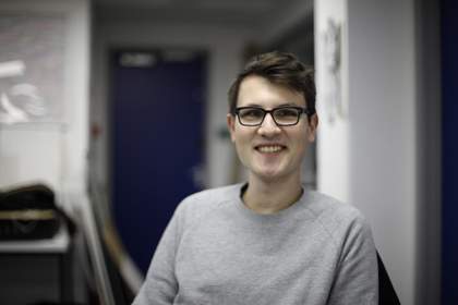 Portrait of Michel Erler sitting in an office