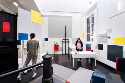 Visitors inside the recreation of Mondrian's Paris studio at Tate Liverpool