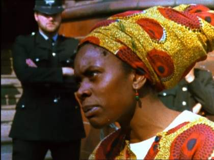 Woman wearing an african head scarf