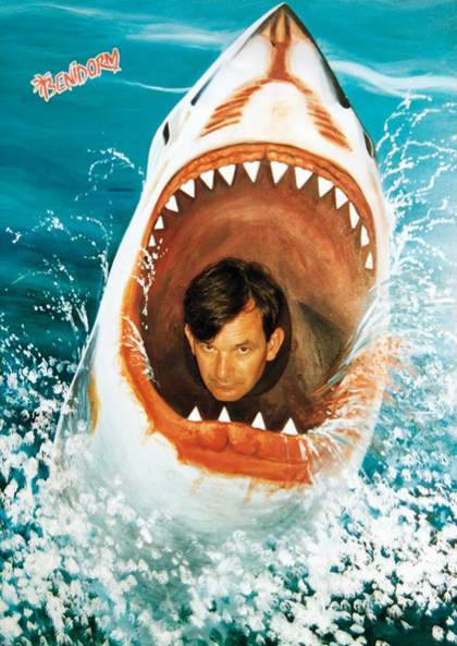 Photograph showing a man appearing in the open mouth of a shark
