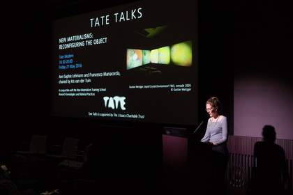 A speaker presents to the audience at the New Materialism Training School, 2016