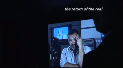 film still from interview with Phil Collins