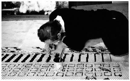 Sigmar Polke working in his studio on Front of the Housing Block (Häuserfront), 1967