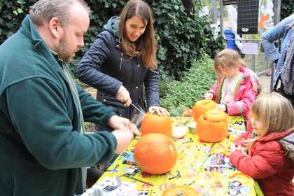 Pumpkin carving in the community garden