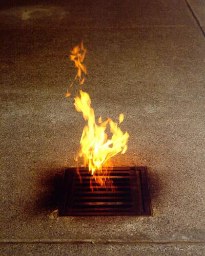 Roger Hiorns Vauxhall 2003 flames arising from a grate in the floor