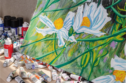 A detail of a painting of flowers