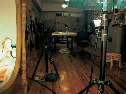 Sherman in mirror in her studio
