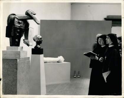 Jacob Epstein’s Torso in Metal from ‘The Rock Drill’ 1913–15 photographed during a private view of his retrospective exhibition at Tate Gallery, London, September 1952