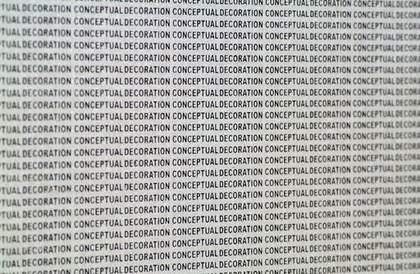 Stefan Bruggemann Conceptual Decoration Black on Silver 2009 silver wallpaper printed with the phrase Conceptual Decoration repeated in black arial font 