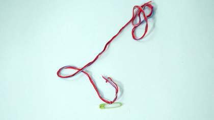 Photograph of making a friendship bracelet
