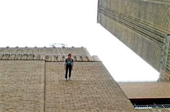 Trisha Brown, Man Walking Down the Side of a Building 1970