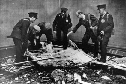 John Rothenstein, then Tate's director, observing bomb damage in the gallery