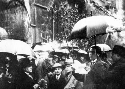 Tristan Tzara reading to the crowd at St Julien le Pauvre church Paris